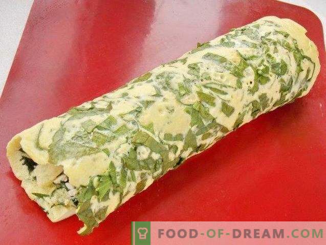 Omelet roll stuffed with cheese, red fish and greens