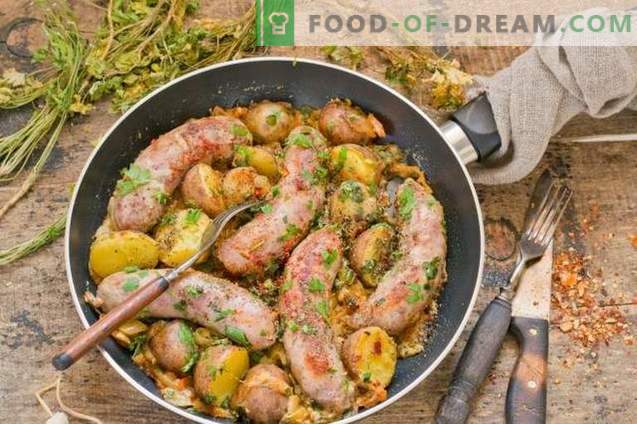 Fried sausage in a pan with country-style potatoes
