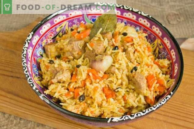 Delicious pilaf with pork in a duck on the plate