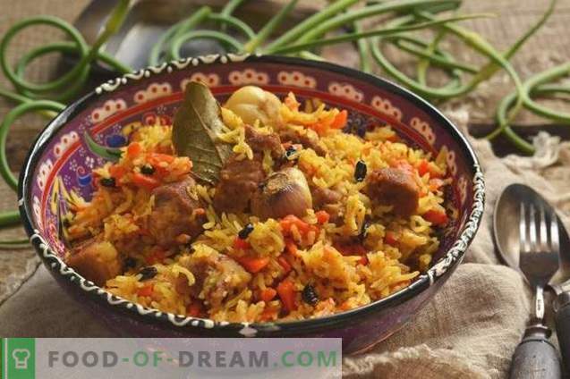 Delicious pilaf with pork in a duck on the plate