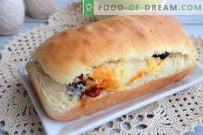 Pie roll with olives, dried peppers and cheese