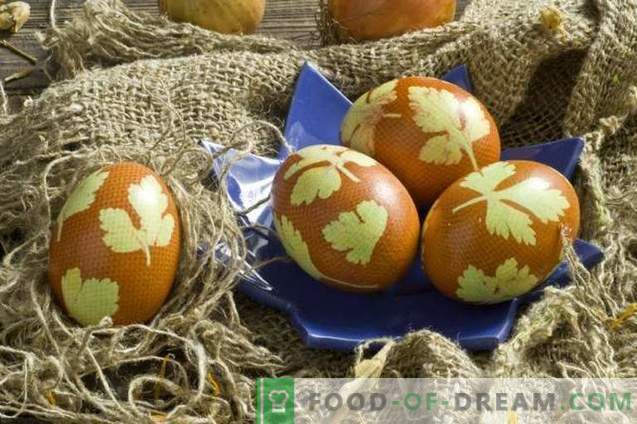Painted eggs for Easter, decorated with parsley leaves