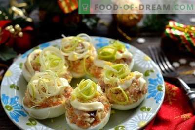 Eggs stuffed with herring and melted cheese