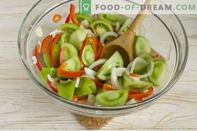 Salad of green tomatoes with onions and peppers for the winter