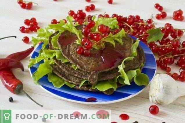 Pancakes from chicken liver with red currant sauce