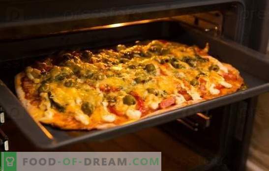 The pizza recipe in the oven is a favorite dish at home. Pizza recipes in the oven: with cheese, mushrooms, ham, seafood