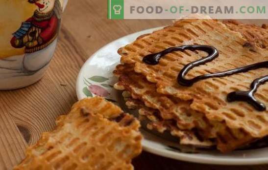 Thin waffles - crispy snacks! Recipes of different thin waffles on butter, milk, sour cream, kefir, with honey and lean version