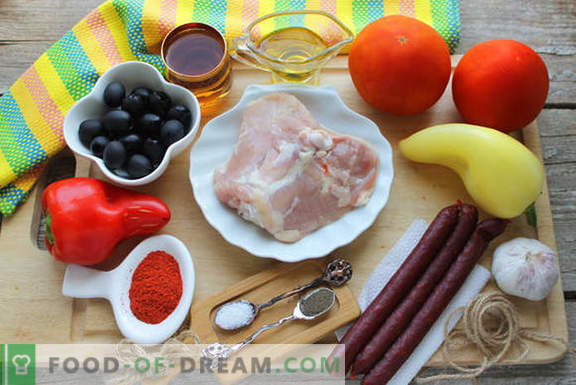Cooking chicken in Spanish: with tomatoes, wine and smoked sausages